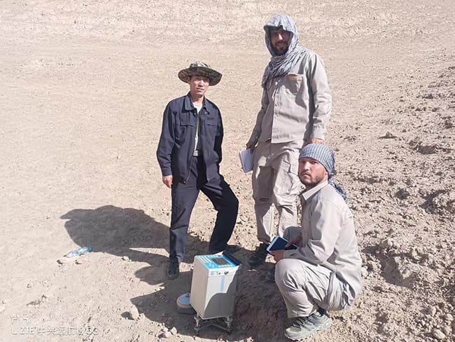 Chinese and Afghan Geologists in the field